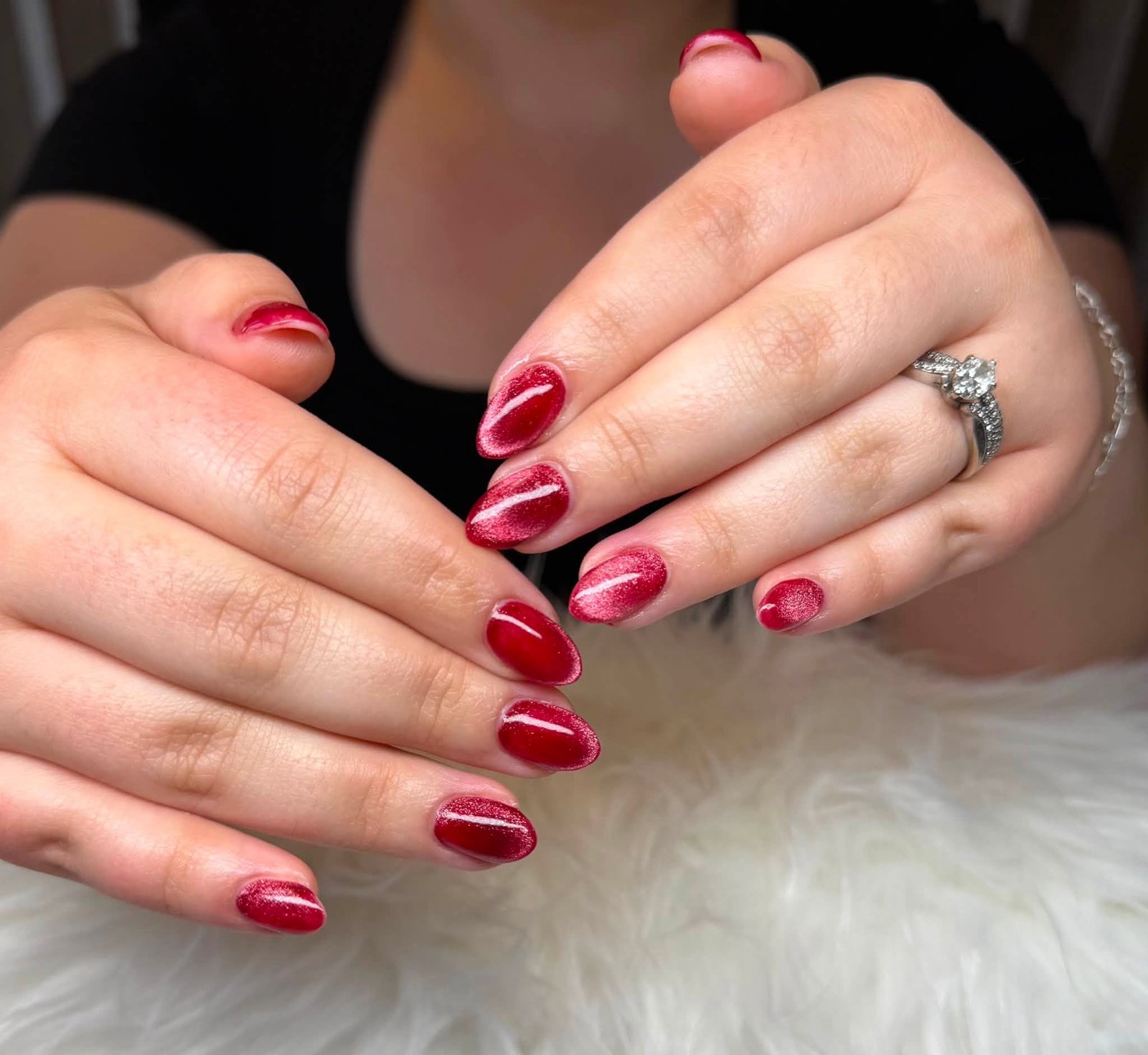 Deep red cat-eye shimmer manicure