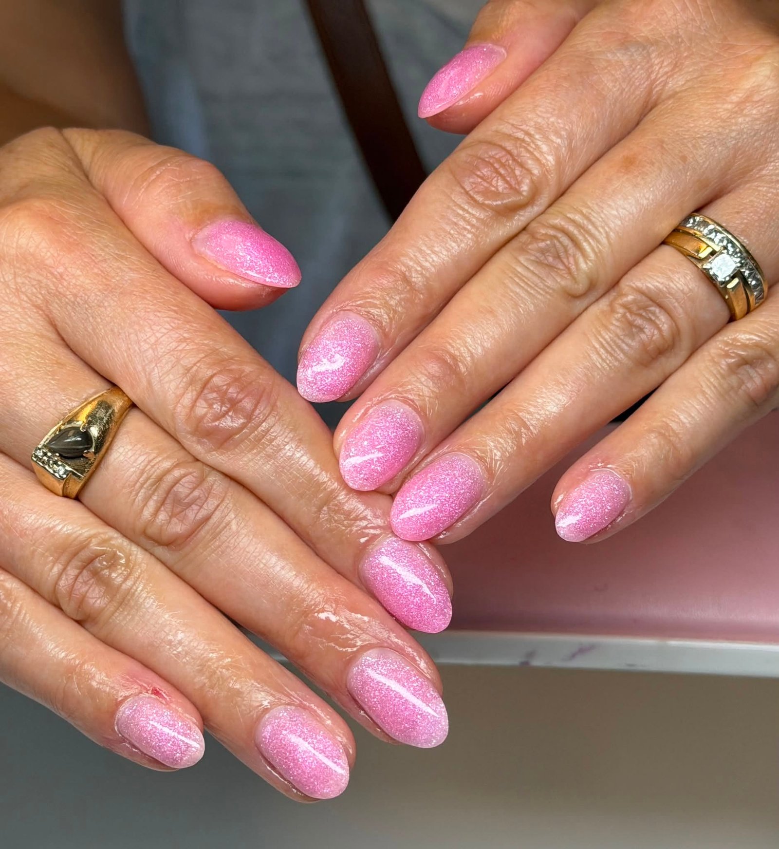 Pink glitter gel manicure