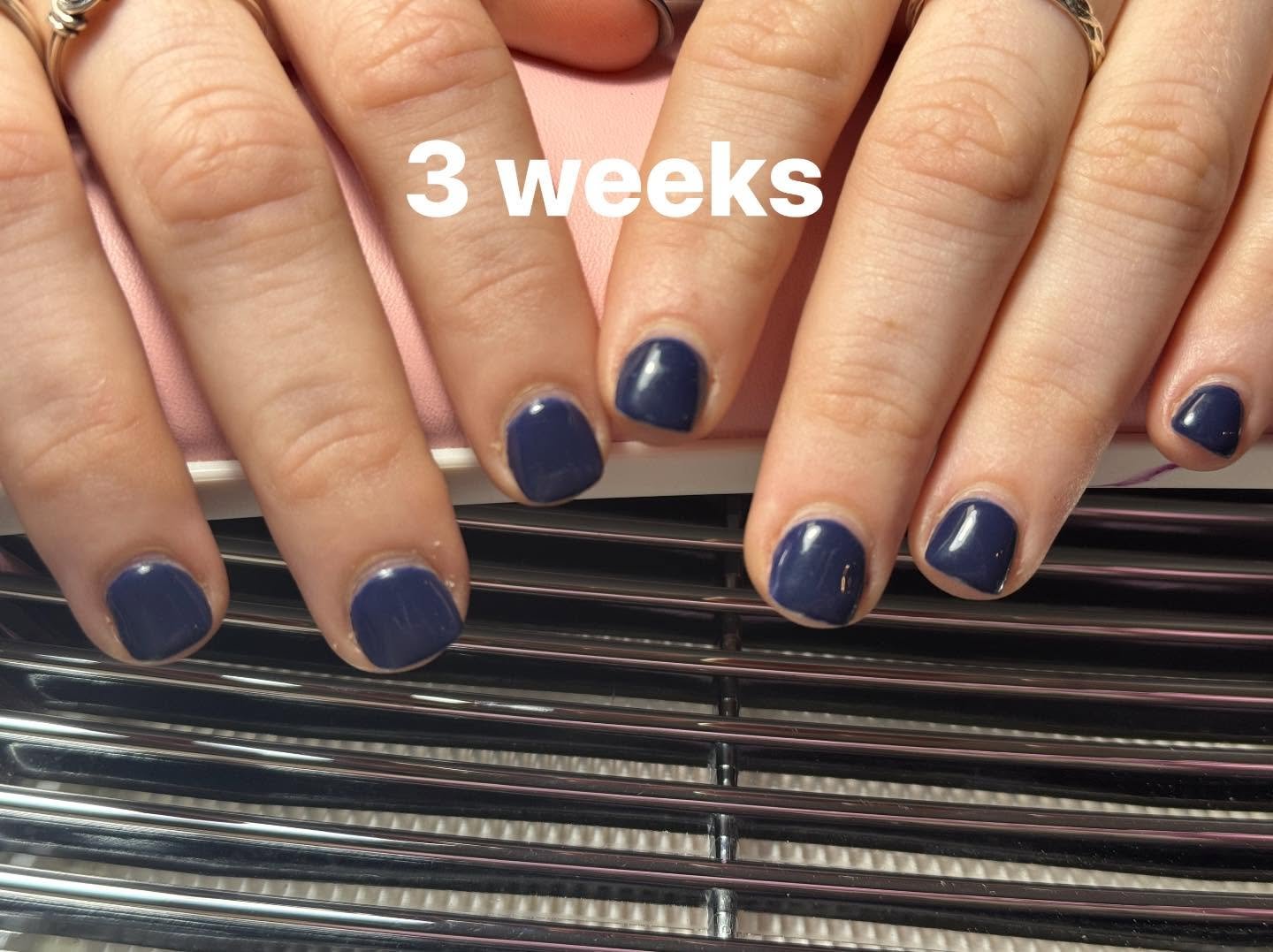 Solid navy blue gel manicure