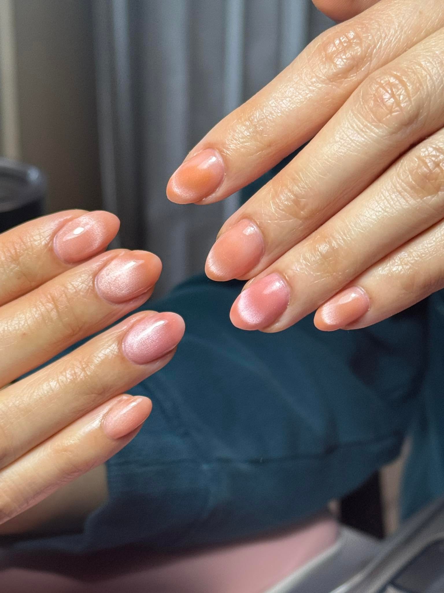 Soft nude pink shimmer gel manicure with glossy finish