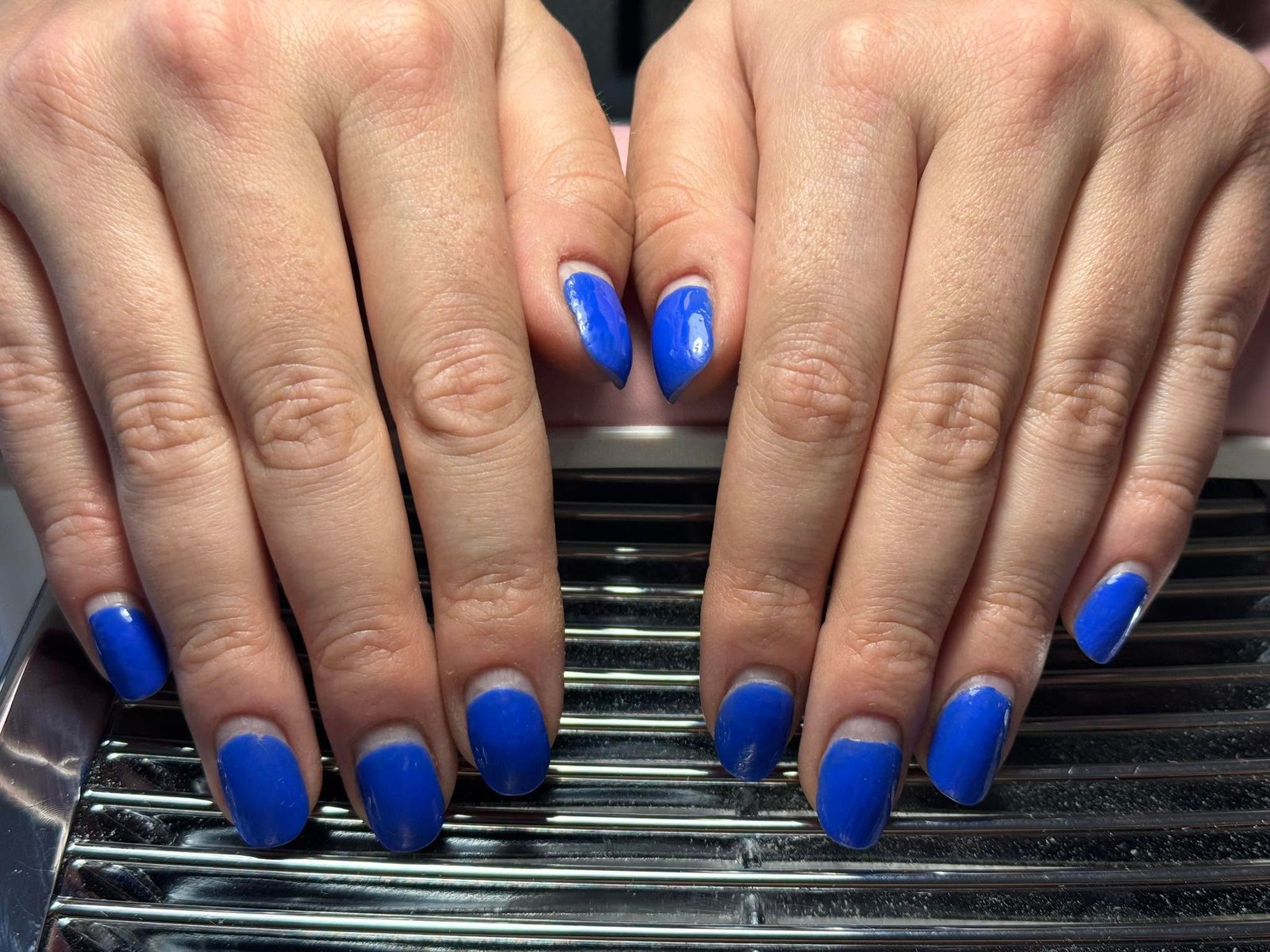 Cobalt blue solid gel manicure with glossy finish
