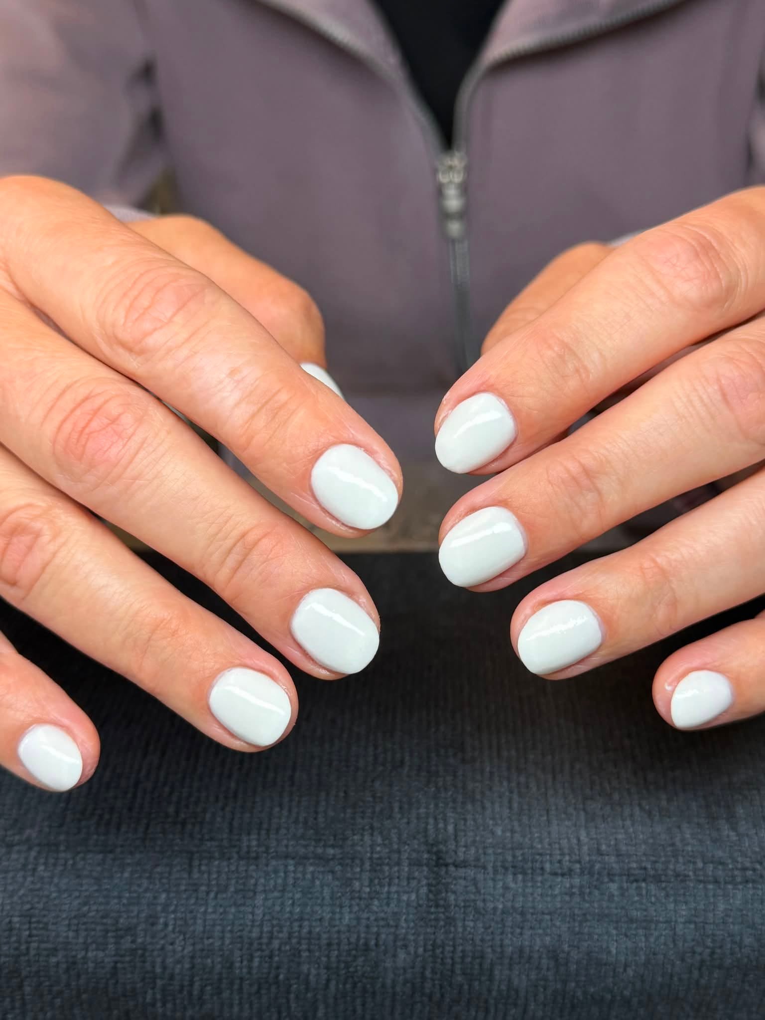 Plain white glossy gel manicure