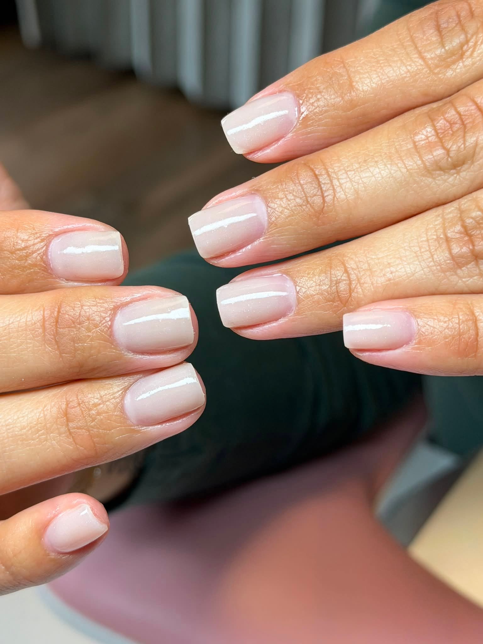 Sheer nude glossy gel manicure