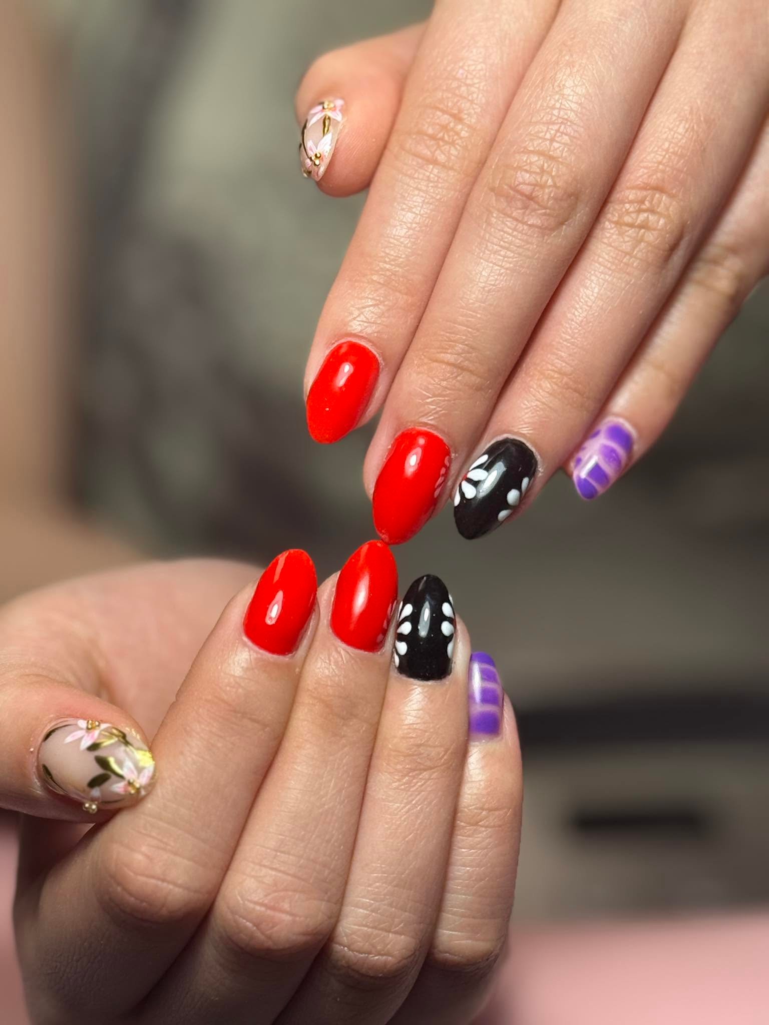 Mixed red, black polka-dot, purple stripe, and floral nail set