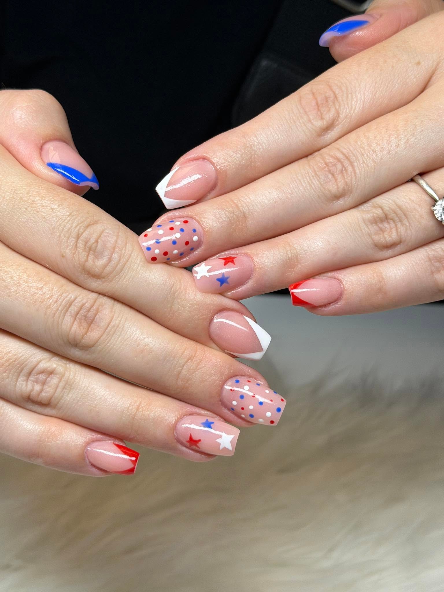 Patriotic red white and blue French tips with stars